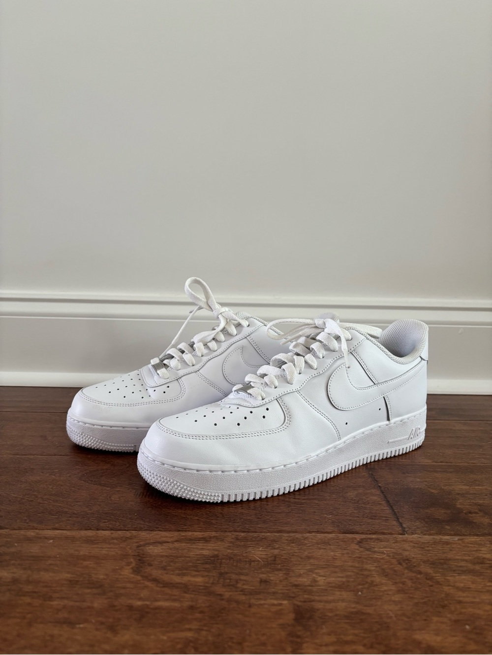 Nike All-White Low-Top Leather Sneakers - Picture 2 of 6